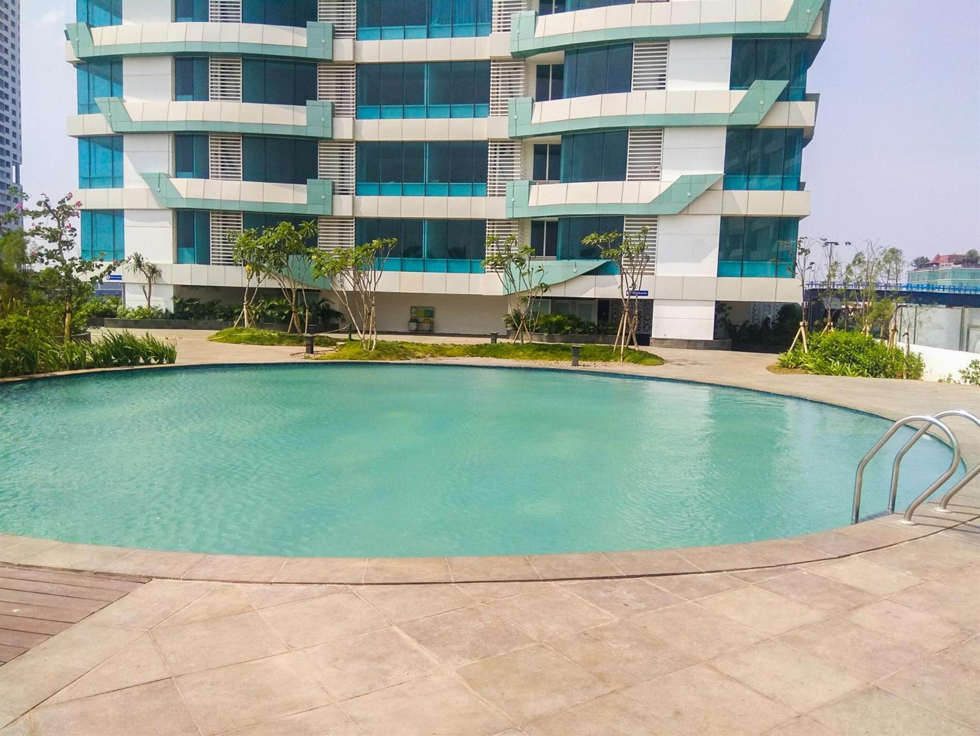 Apartemen Cozy And Great Choice At Grand Kamala Lagoon By Travelio